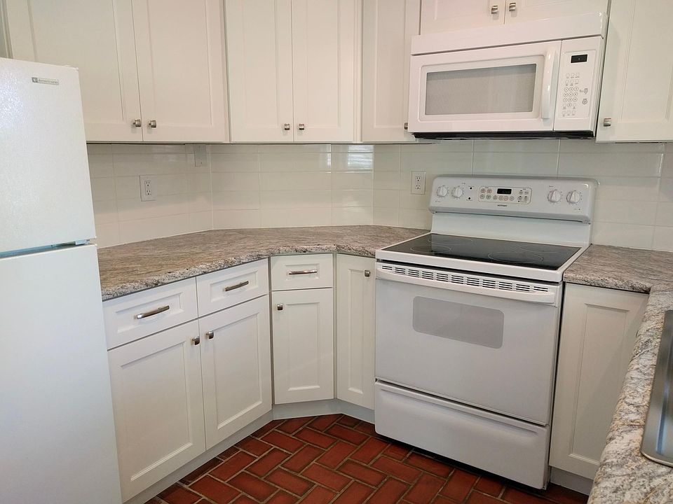 Kitchen west wall and south wall on the left