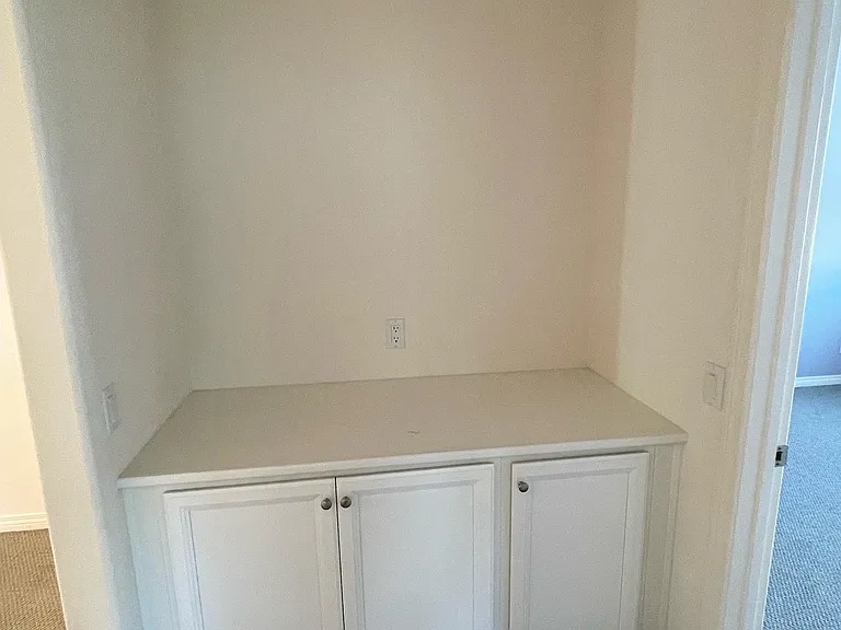 storage cabinets and photo shelf - walkway