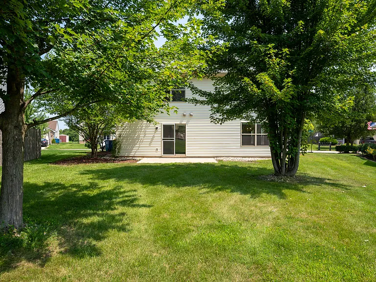 Large backyard backing up to neighborhood park