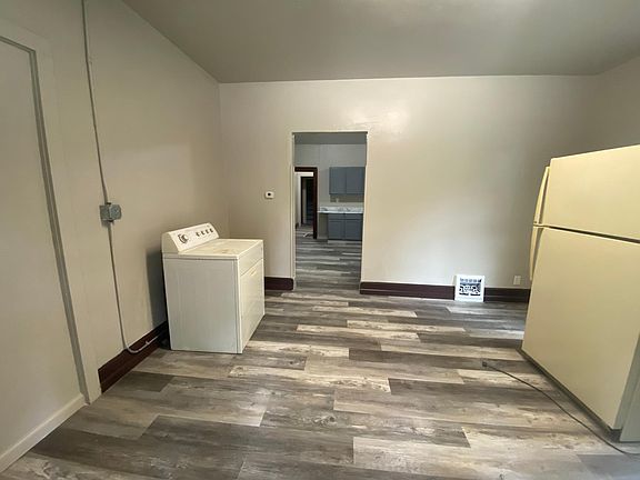 The washing machine and fridge will be removed before moving in