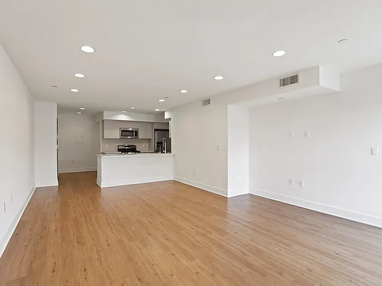 Open-Concept Kitchen, Dining, and Living Room Areas