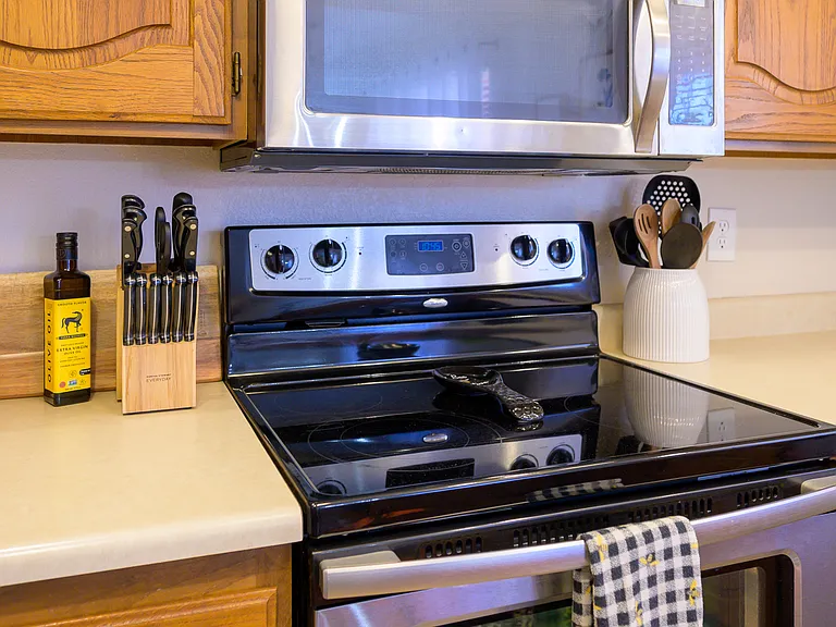 Microwave and electric over/range ready for your stay.