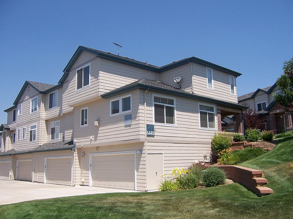 View shows 3 levels: 2 car garage / storage room, main level, upper level 2 bedrooms