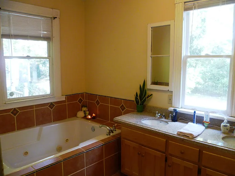 Double vanity is master bathroom.