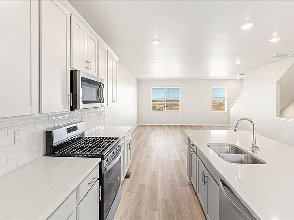 The Belford floorplan interior image taken at a Meritage Homes community in Broomfield, CO.