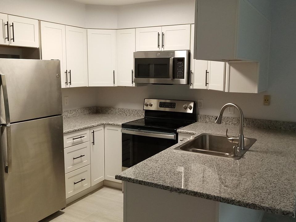 Modern door pulls added to new cabinets