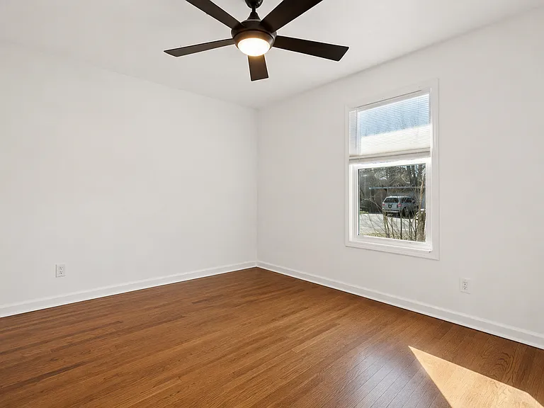 Primary bedroom unfurnished (digitally altered w/ furniture removed).