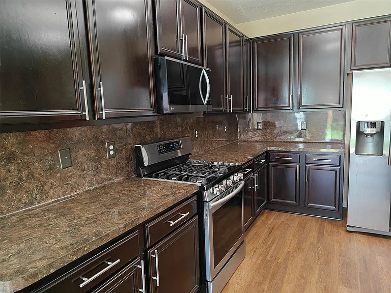 7915 Moss Springs Ct — Photo 13