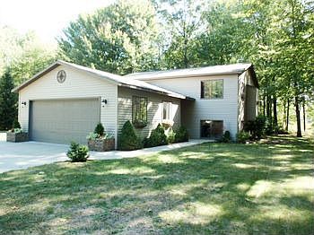 Large 2.5 Garage finished with drywall & lots of storage cabinets...