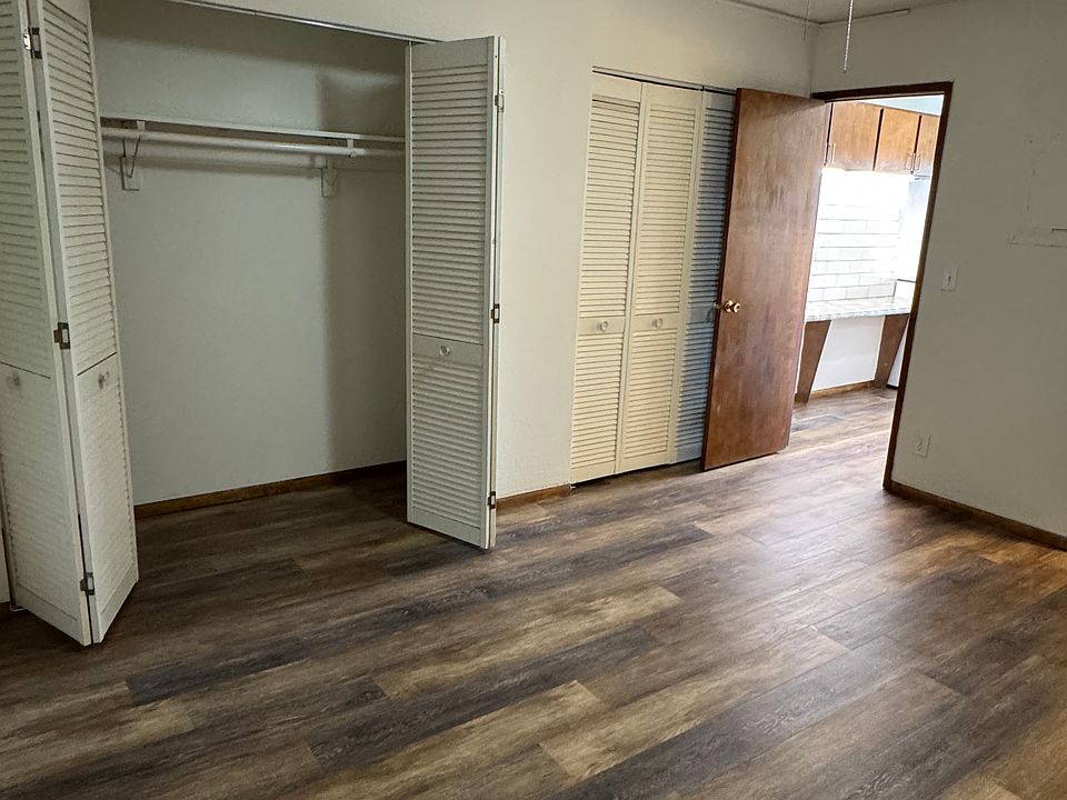 Back bedroom with new vinyl plank flooring.