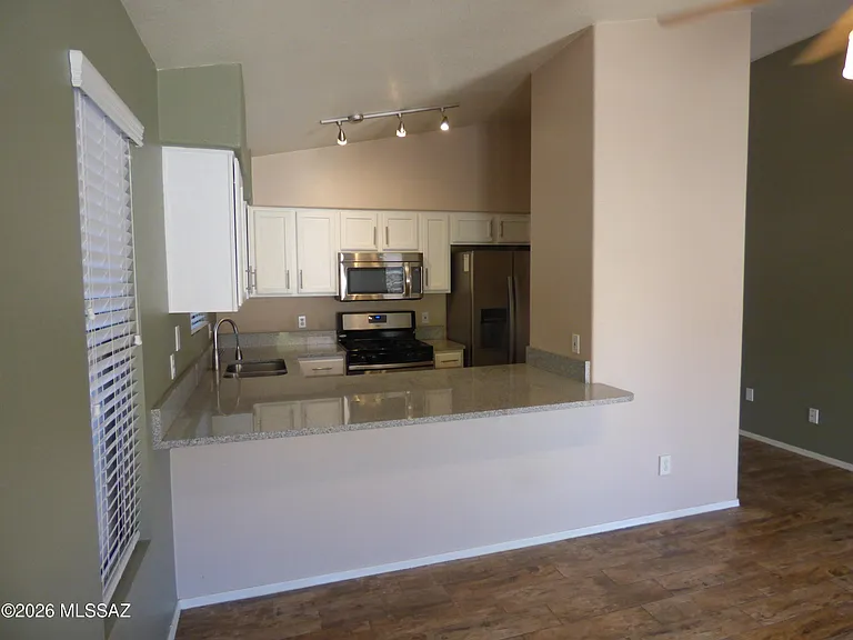 5562 W Peaceful Dove Pl — Photo 12
