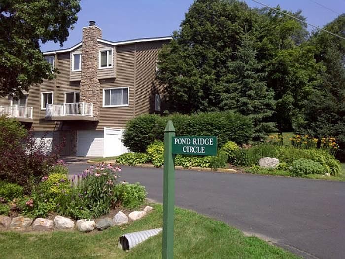 Neighborhood entrance and gardens.
