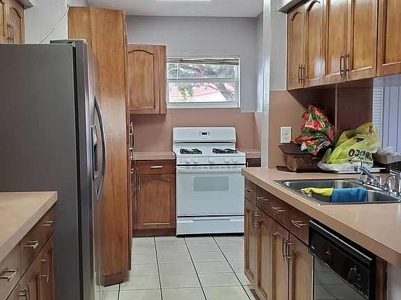 Kitchen with newly refinished cabinets and plenty of storage