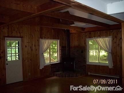 Living room with vaulted ceiling