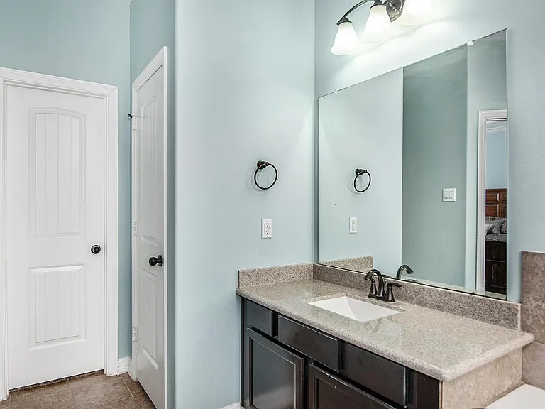 Dual-sink vanity in the primary bathroom