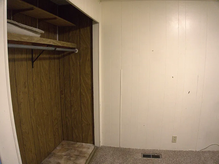 Closet 1 in Bedroom 1. Carpet is different in closet than in main room.