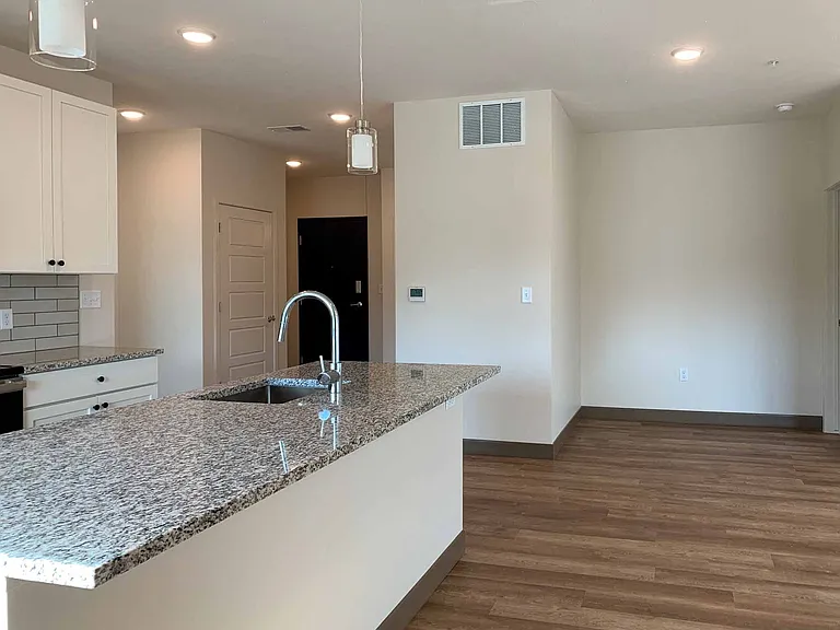Our open-concept living and dining spaces are designed for modern living, with high-end finishes and thoughtful details.
