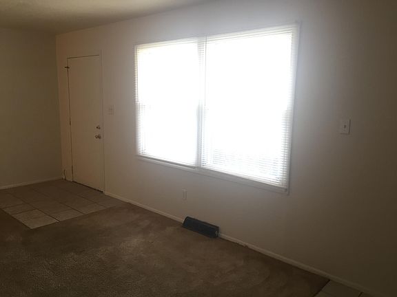 Living room entry and windows.