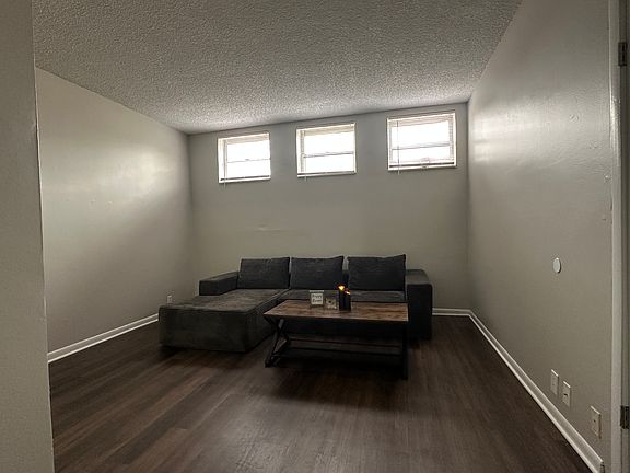 807 Living room Freshly painted, new plank floor, natural sun light through windows.