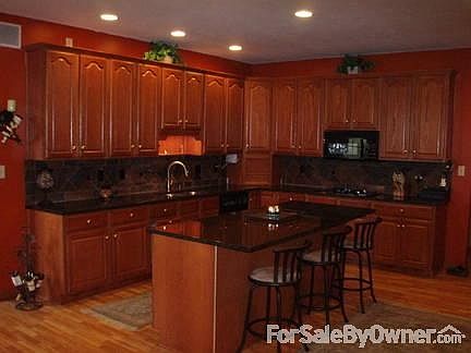 Recently renovated kitchen
						:
						Black granite countertops, Kitchen Aid appliances, under cabinet lighting