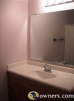 One of three full bathrooms