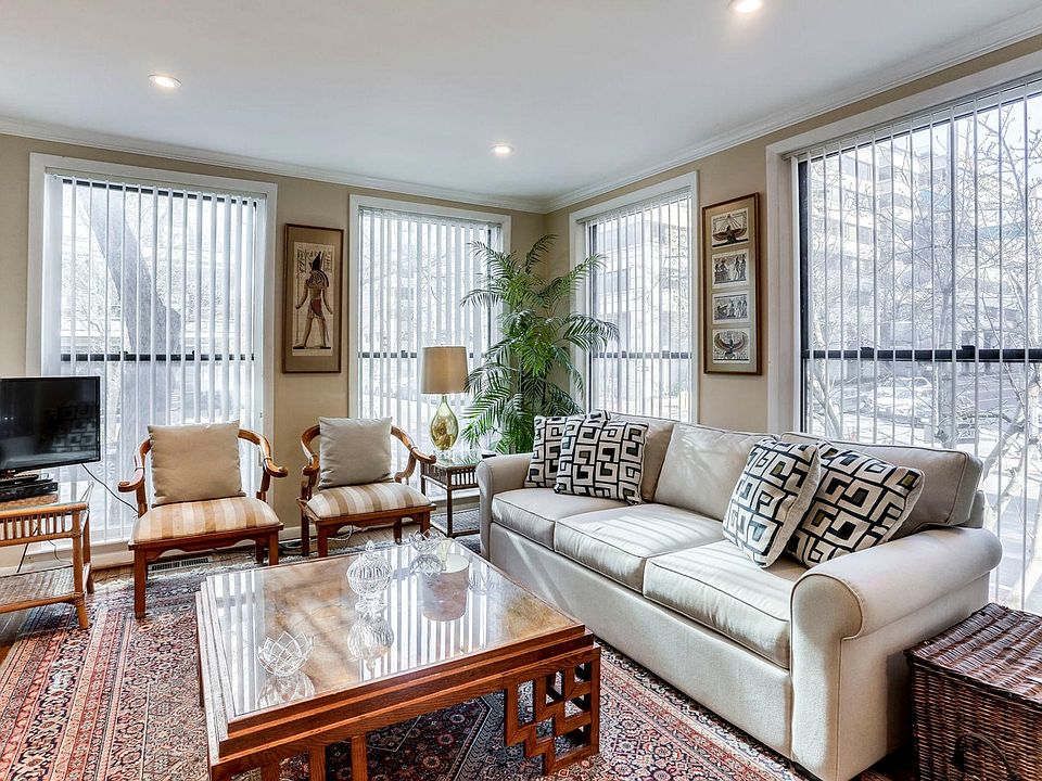 Living Room with Queen Sofa Bed overlooking 25th and M Street NW