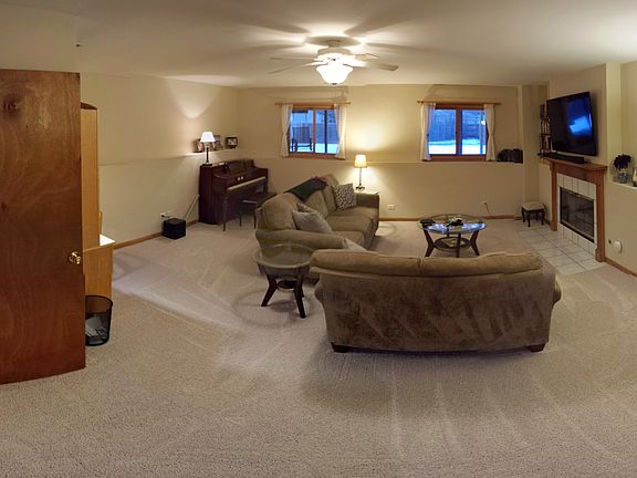 Living area w/ .5 bath & FP