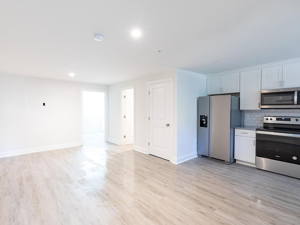 Large living space next to kitchen
