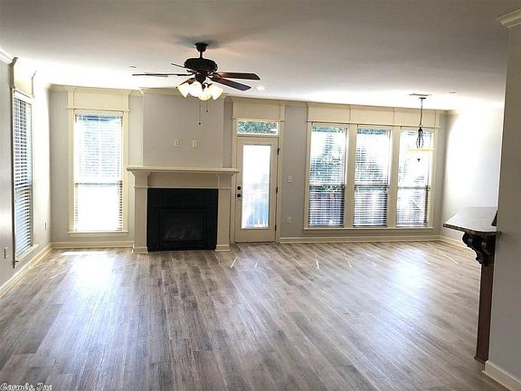 Large Living Area with Gas Fireplace and access to rear deck.