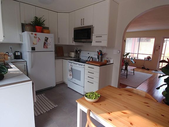 Kitchen with view to living room