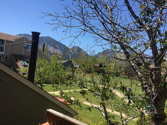 View of the Flatirons from the private deck
