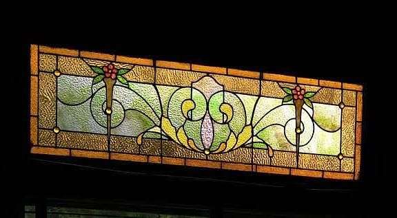 Beautiful stain glass in bedroom.