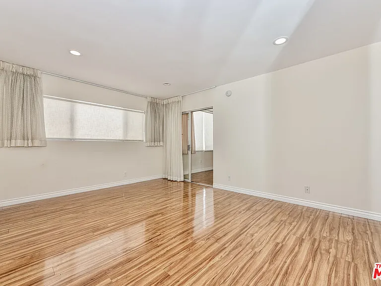 237 N Almont Dr #303 — Photo 6