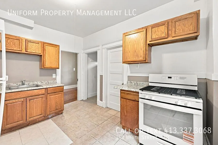 Updated 3BR Apartment in Forest Park — Photo 1