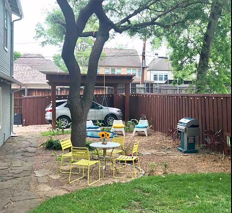 Private yard and view of covered parking for exclusive use by the tenant