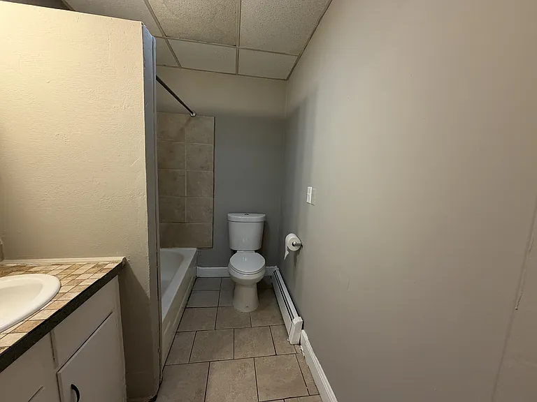 455-457 Post Ave #1 — Photo 6