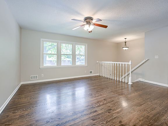 Living Room (unfurnished) featuring nice hardwoods