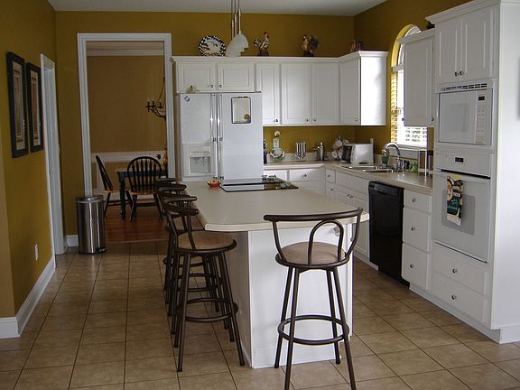 Large kitchen with some new appliances