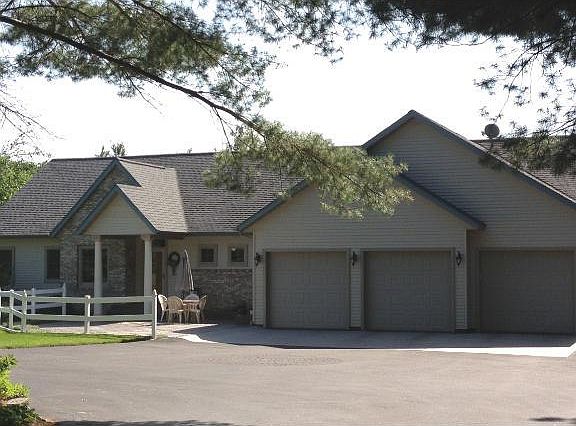This One-Story Home offers it all, Privacy, Acreage and 50 feet of Lake Frontage.