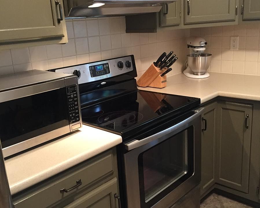 Stainless steel stove with glass cooktop