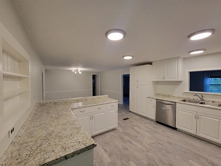 Kitchen showing new tile flooring