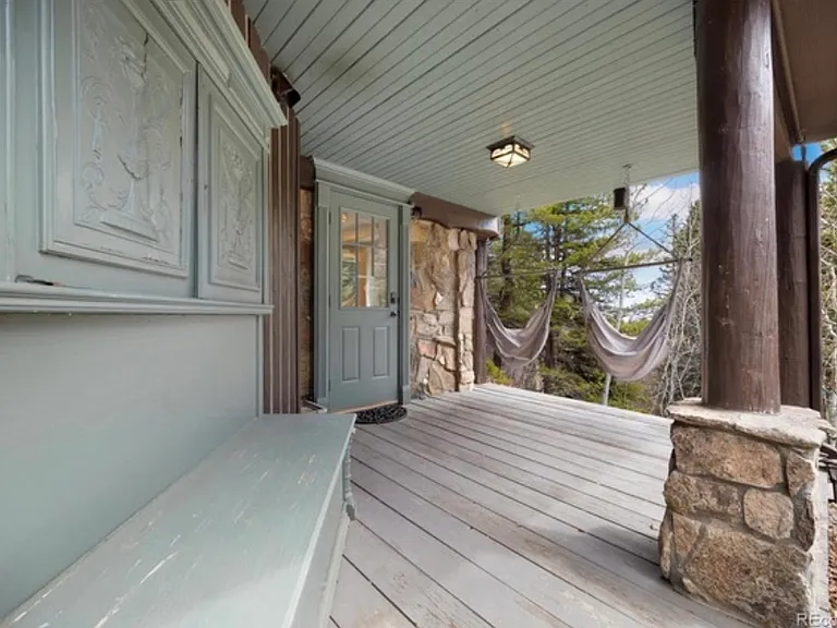Private porch with comfy swings and views of the sunsets down the canyon. We are on a private road with only one other house