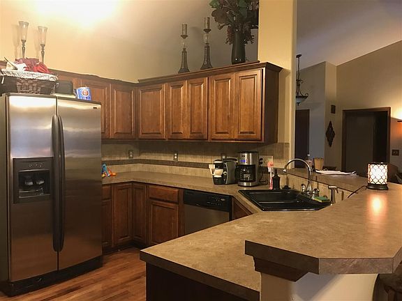 View of the kitchen from the master bedroom doorway.