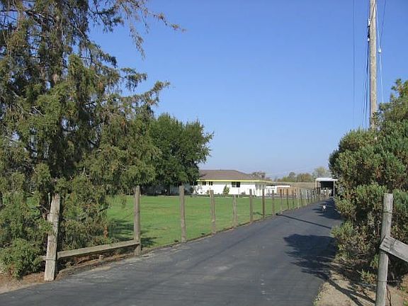 Lots of trees line the property which is well off the main road.