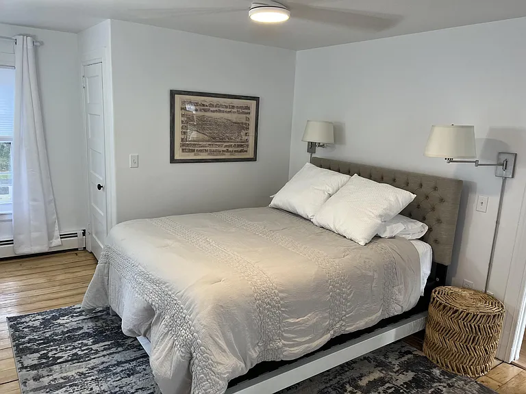 Bedroom- ceiling fan, reading lights, gorgeous floors.
