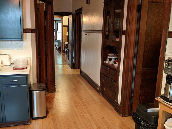 Kitchen to hallway to dining room