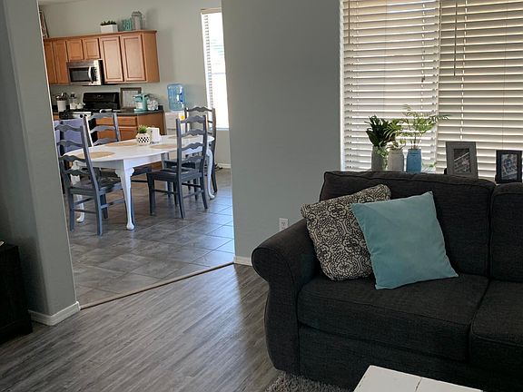 Spacious living room with wood floors