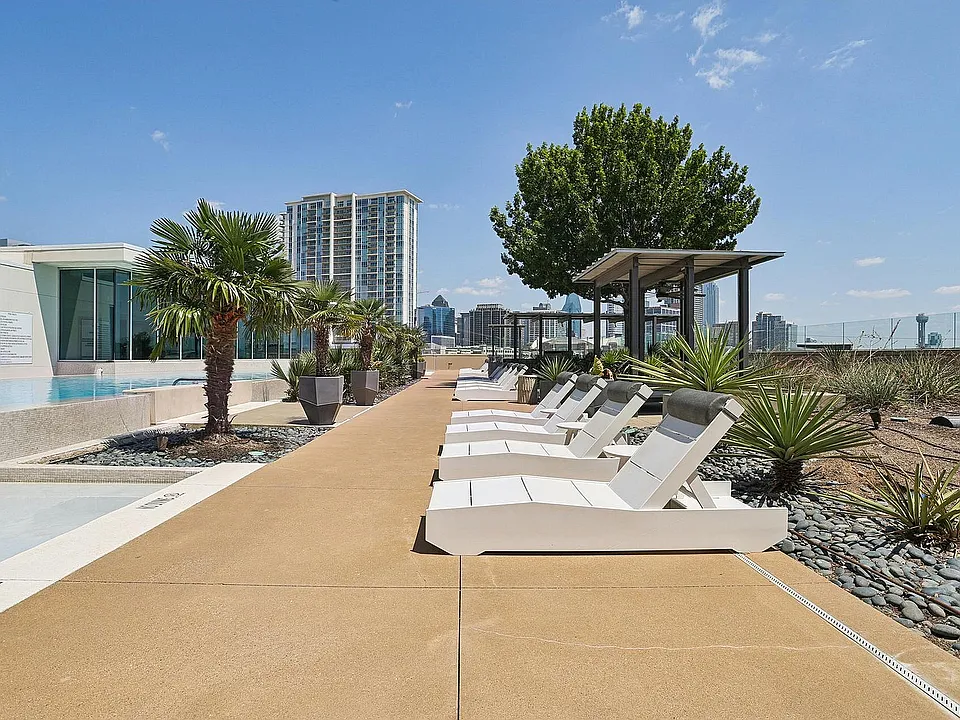 Luxurious Pool Deck with Skyline Views