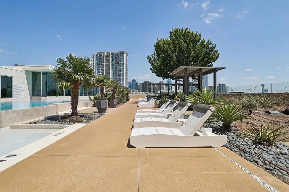 Luxurious Pool Deck with Skyline Views