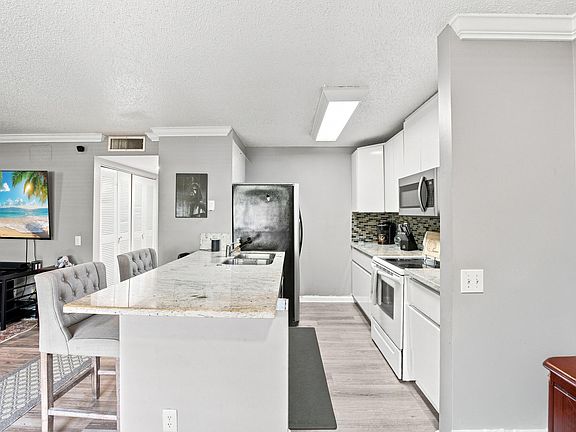 2nd image of 711 FOREST CLUB Drive #119
